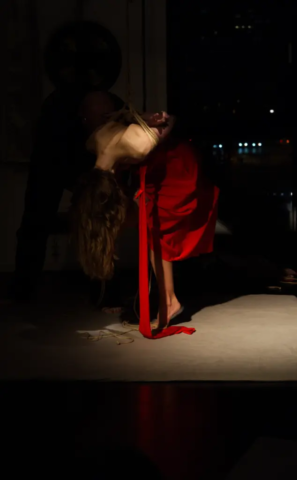 Visual representation of a Kinbaku Shibari Japanese Rope Bondage Performance by Alexander MA and Natasha NawaTaNeko in IKSK Berlin, Girl in red dress, sexpositive, conscious sexuality, couple