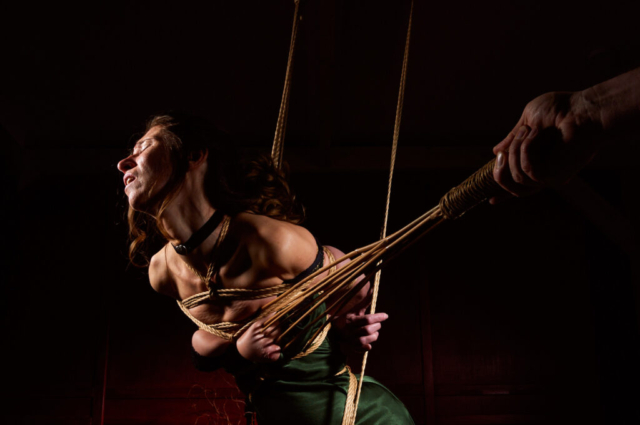 A woman in green dress - Natasha NawaTaNeko - tied in Shibari, Kinbaku, Semenawa, Japanese Bondage in Studio by Alexander MA, Photosession